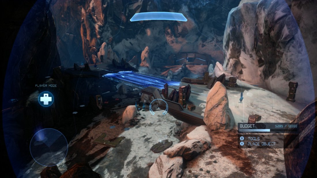 Meltdown is one of Halo 4’s symmetrical medium sized maps. You’ll note that as with Longbow, the map is half covered in snow and half in dirt. We’ll call the snow half the Ice side of the map and the dirt, the Fire side.  Meltdown features two bases at opposing ends of a valley [Fire Base] and [Ice base]. The top of the map consists of three main pathways. From the top entrance of each base, you will see a bridge in front [Fire Bridge] and [Ice Bridge]. From the opposite side of the bridge, you can head straight ahead along the ledges that allow players to circle around the outside of the map to the entrance of the opposite base. Alternatively, you can turn right once across either bridge to find a third bridge [Light Bridge] leading to the opposing bridge area.  If you choose the high ground along the ledges on either side of the map you will find a small bunker [Fire Bunker] and [Ice Bunker] that give a nice view over the center of the map.  The [Fire Base] and [Ice base] are identical and each consists of two floors with an attached garage containing vehicles on the lower level. These lead out to the lower map.  The lower section of the map is pretty much exclusively for vehicles, and consists of a fairly straight path through the valley with a distinction on the ground to tell between the [Fire Valley] and [Ice valley]. Opposite the exit from each of the bases is a cave [Fire Road] and [Ice Road] each entrance along the way with ramps inside [Fire Climb] and [Ice Climb] leading to ledges on the upper levels.  The ground level features a bunch of jump pads and gravity lifts allowing easy access to the higher ledges. First up there is a jump pad and a gravity lift [Fire Trampoline] and [Ice trampoline] to the left of each base. The right of each base features a jump pad by itself [Fire Push] and [Ice push]. Additionally there is a pair of gravity lifts to either side of the light bridge and another pair of jump pads around the outside of the map [Ice Light] and [Fire Light].  The tactically important areas are: [Fire base], [Ice Base], [Fire bridge], [Ice bridge], [Light Bridge], [Fire bunker], [Ice Bunker], [Fire valley], [ice Valley], [Fire Road], [Ice road], [Fire trampoline], [Ice trampoline], [Fire Light], [Ice Light], [Fire Push] and [Ice Push].