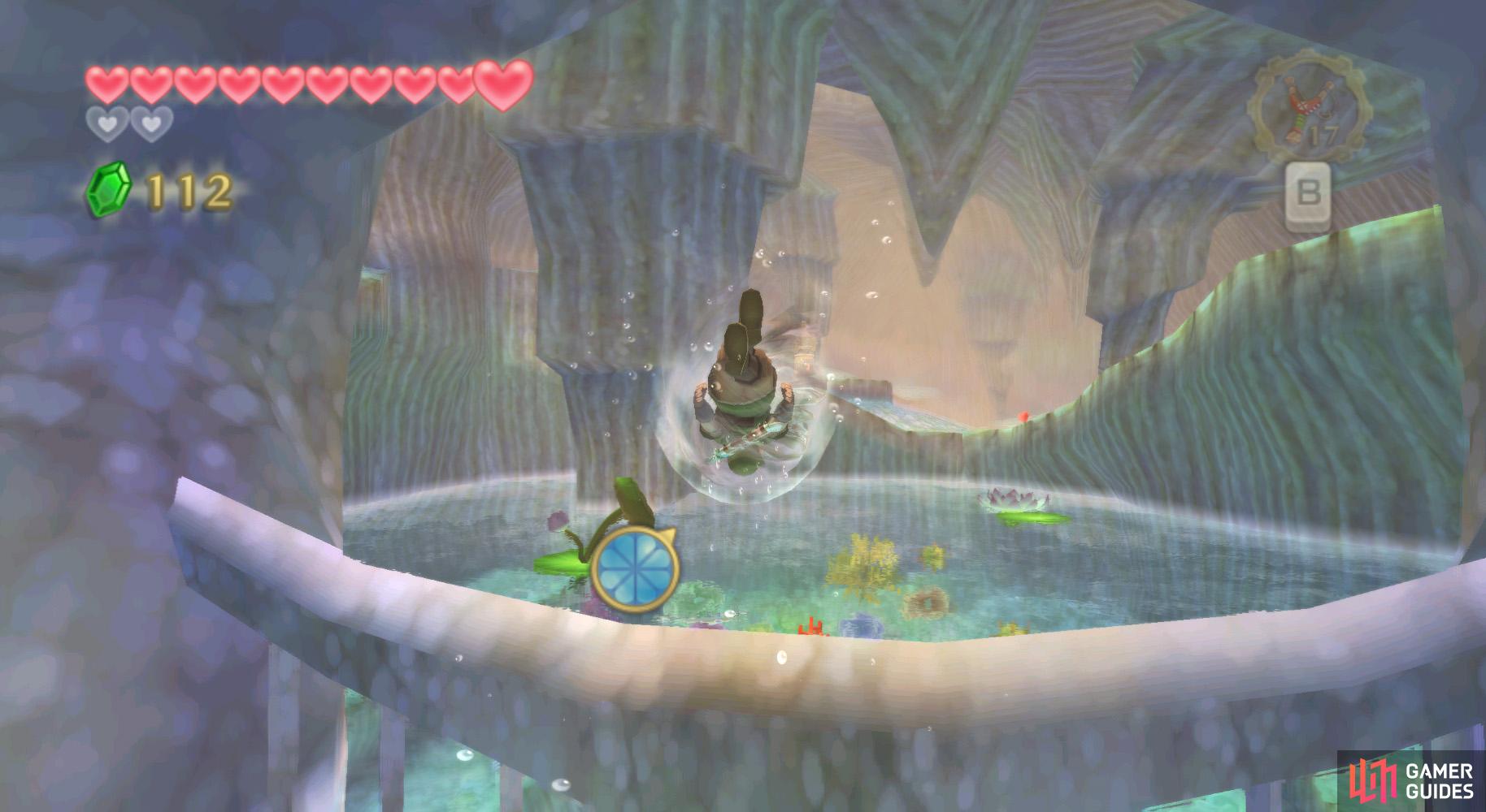If you're struggling to fly over this barrier, try swimming near the surface, before using a spin attack.