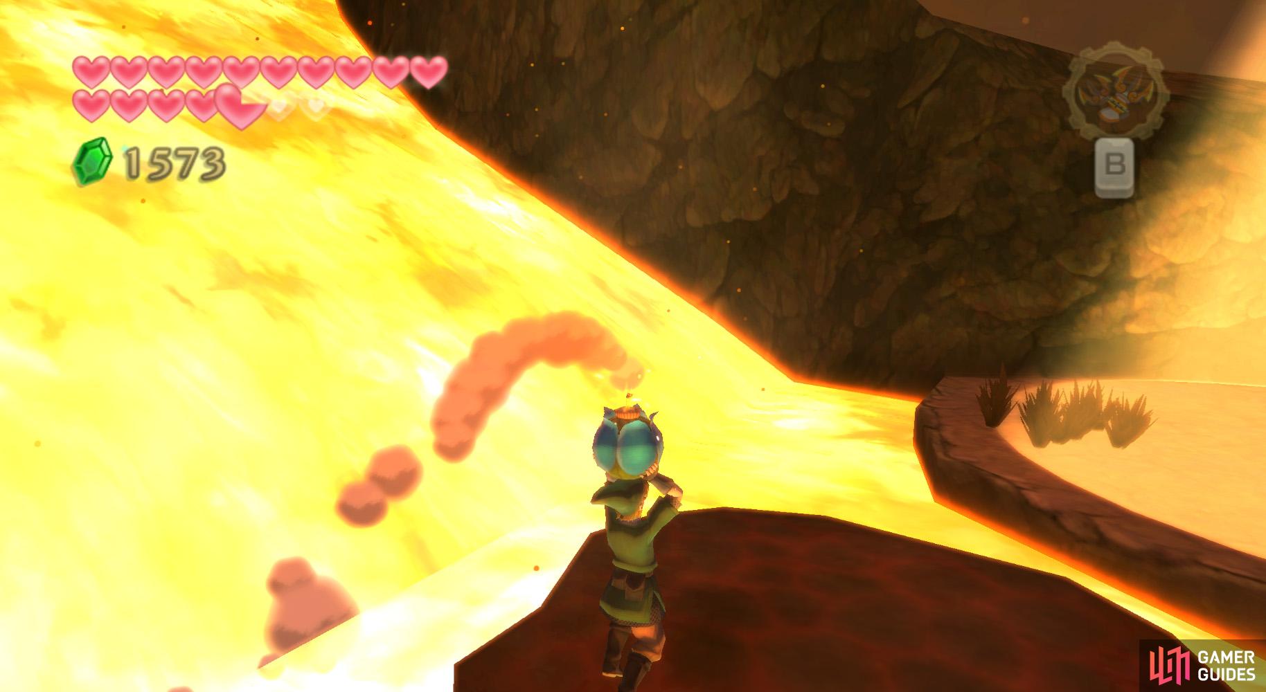 Carrying the Bomb Flower, jump onto the magma platform and chuck the bomb across to the watchtower.