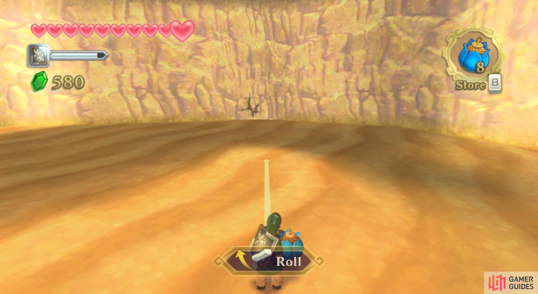 Near the north-east corner of the desert, there's a cracked wall you can bomb.