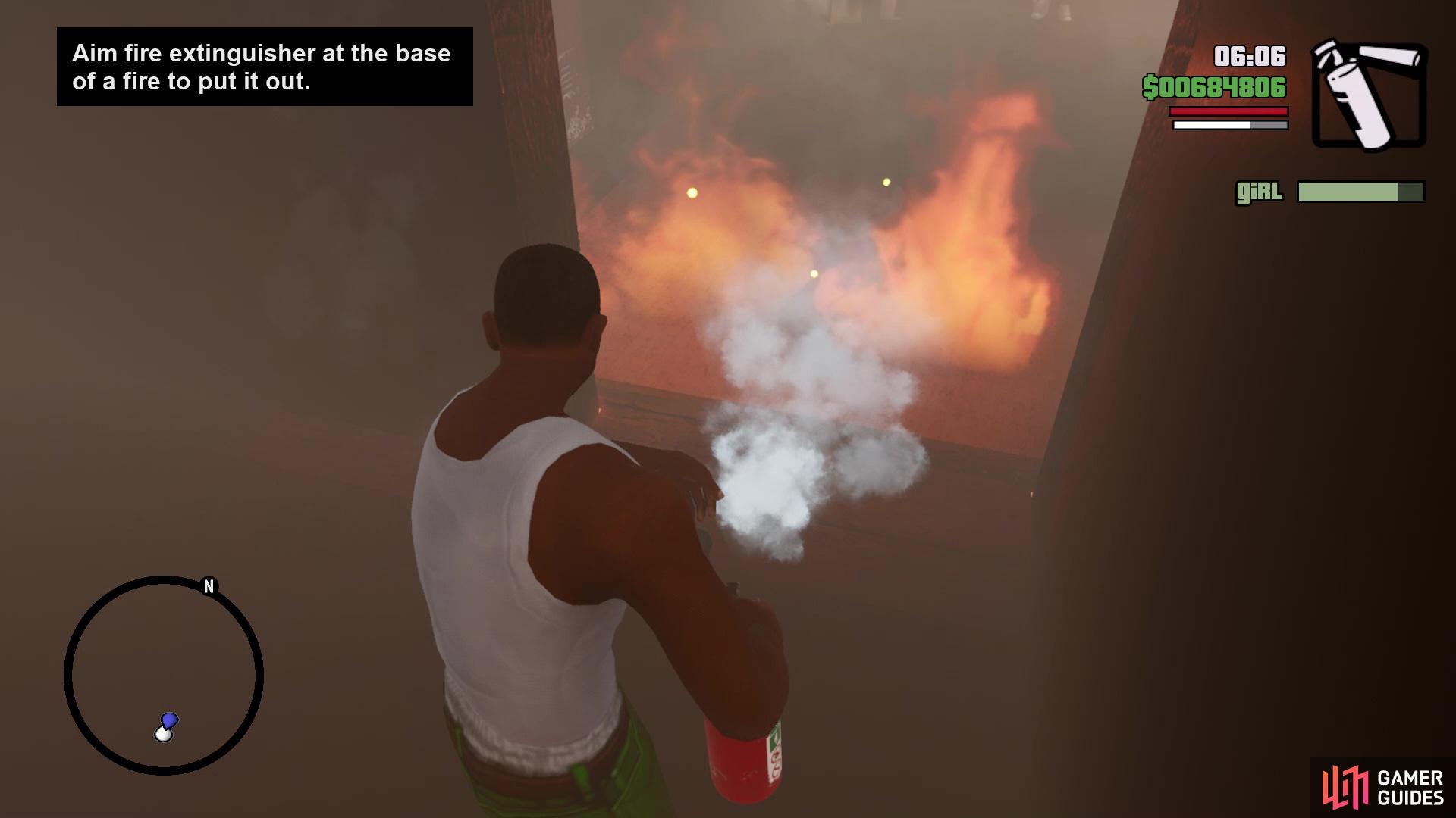 Aim at the base of the fire in order to put it out with the extinguisher