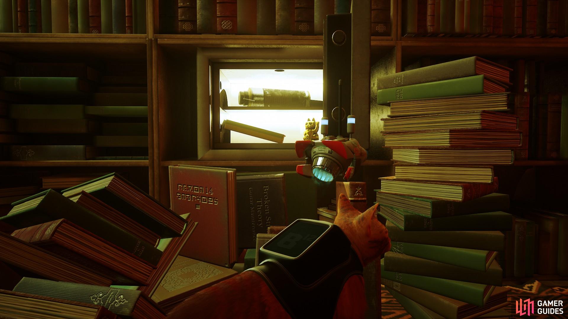 Doc's notebook location is inside this safe, which is revealed by getting a key from the office and tipping over a pile of books.