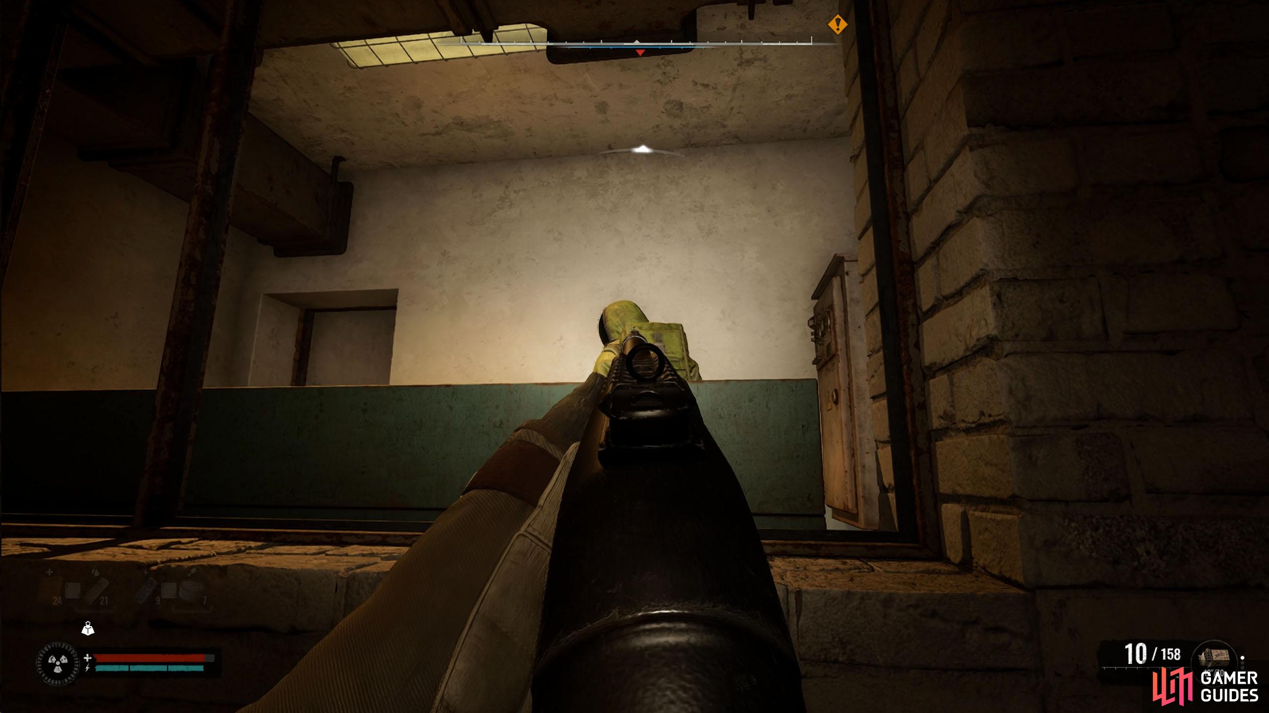 If you jump up near the window, a zombie will get up. Shoot it from here to save yourself later.