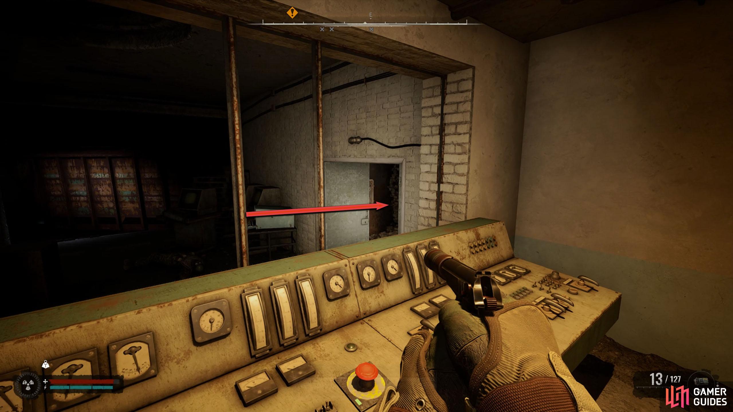Go back to where you shot the first zombie and go through the doors.