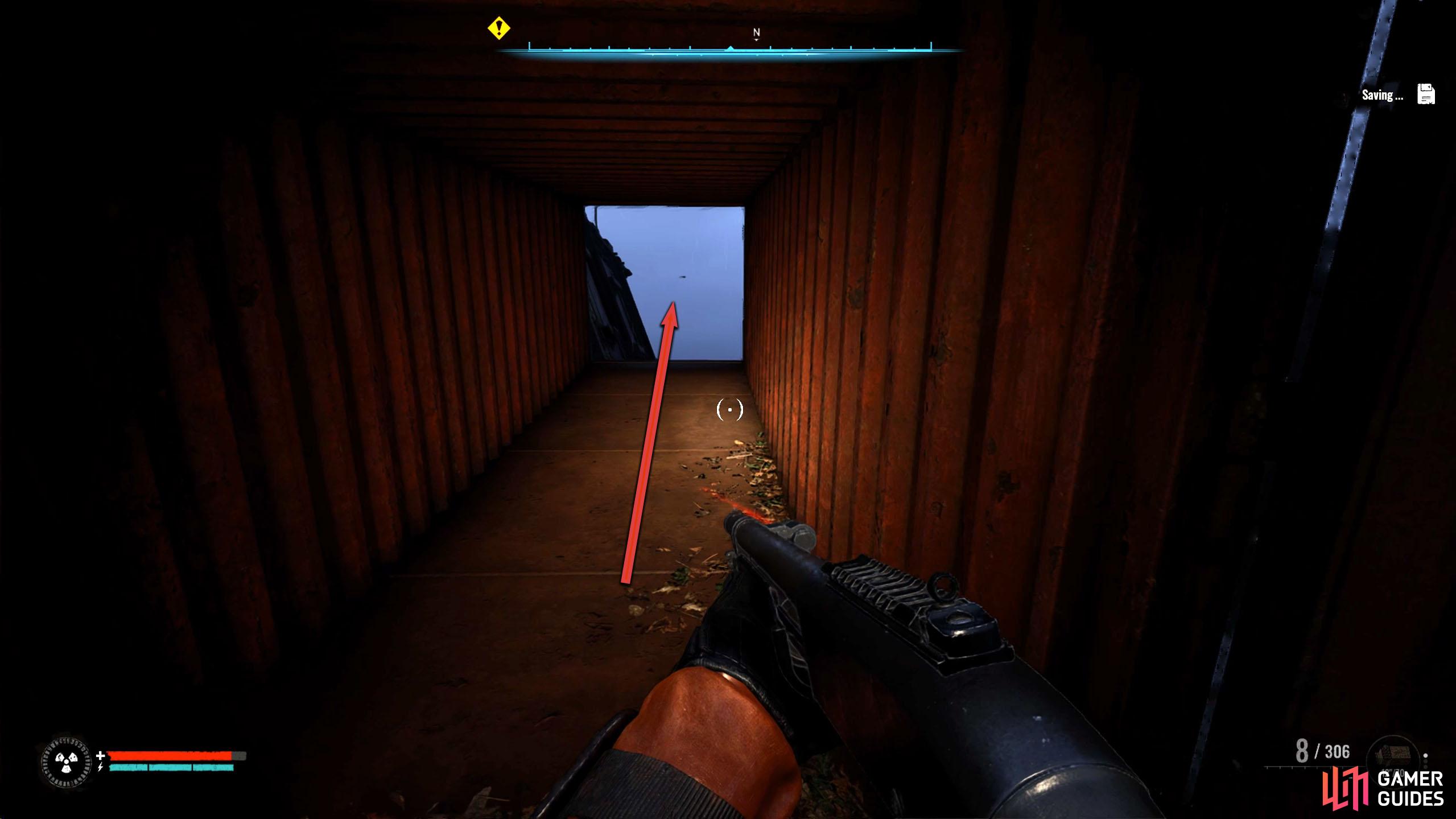 At the end, walk through the open container to reach the ship.