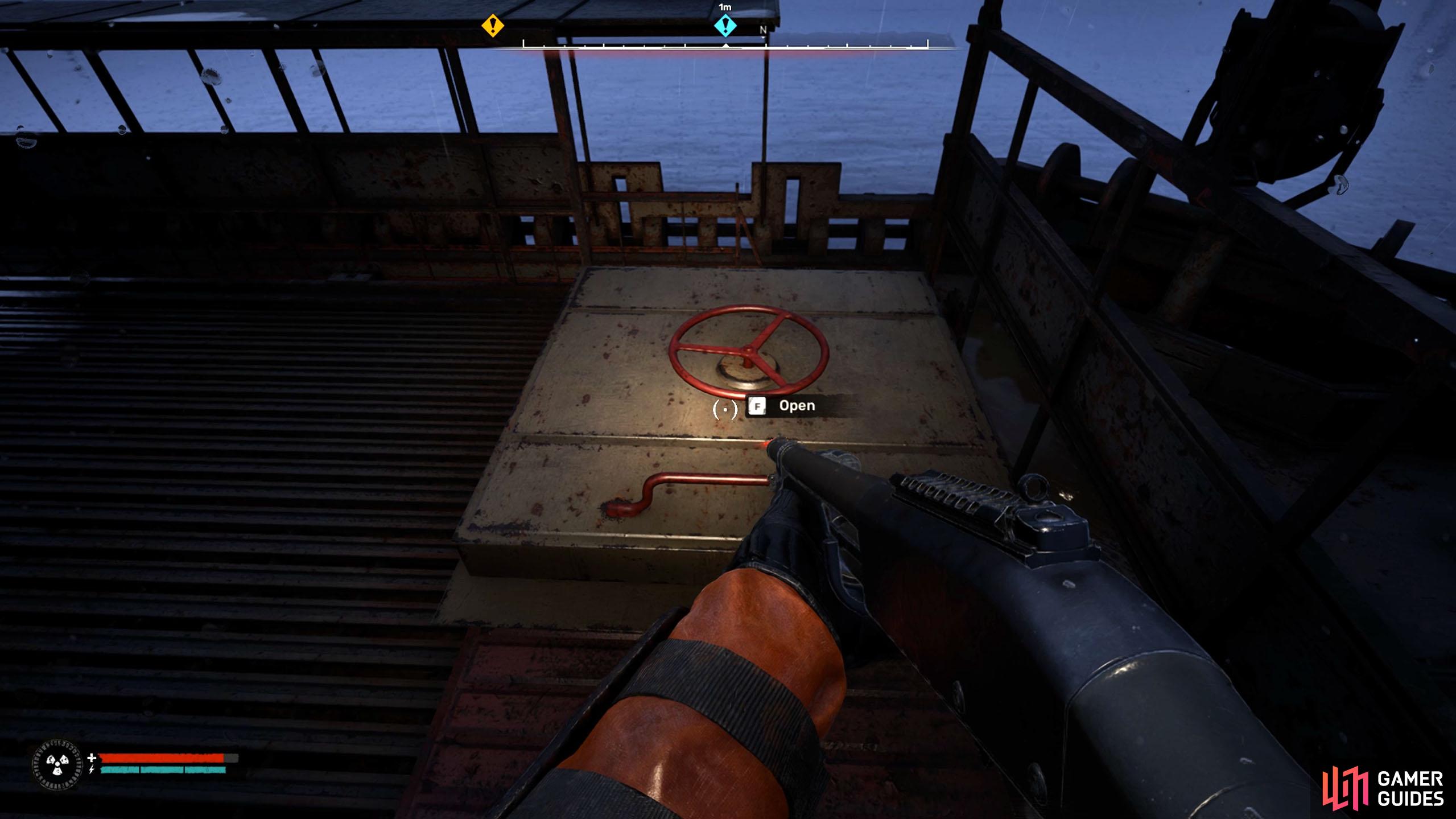 Go up the stairs to your left, and open the hatch.