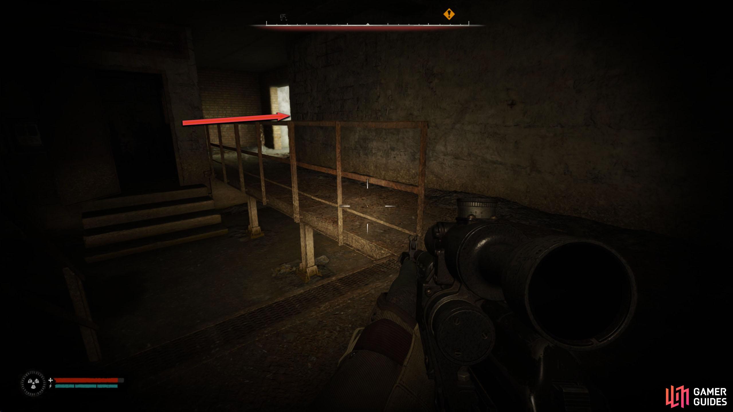 Take the tunnel path to the end and exit the facility.