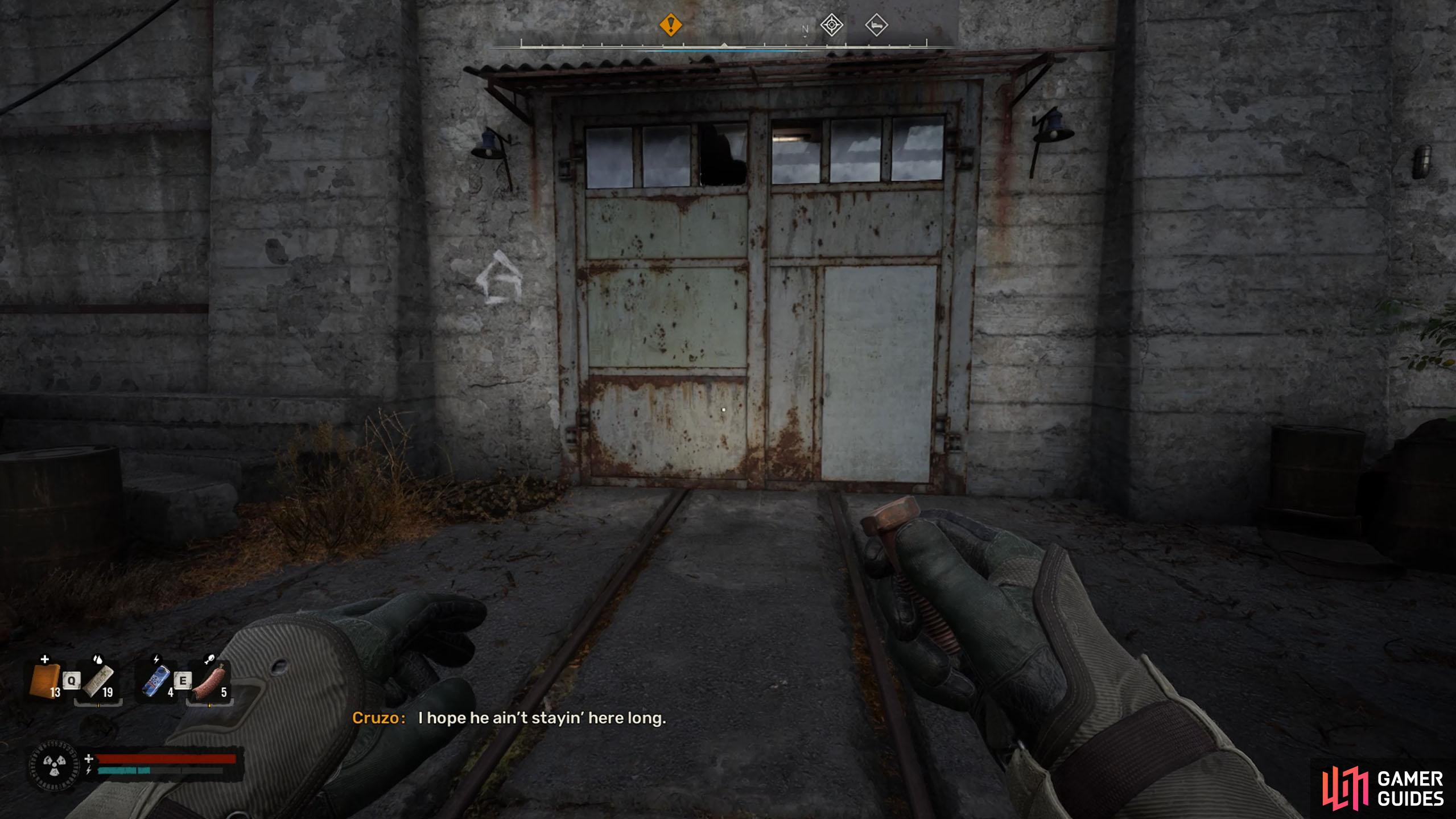 Enter the main base via the white door to the left of the tunnel.