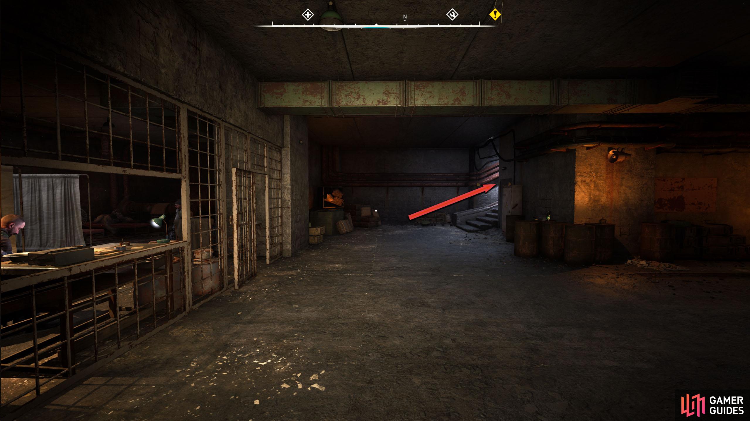 Go down the stairs to your left, head to the other side of the room, and go up the stairs.