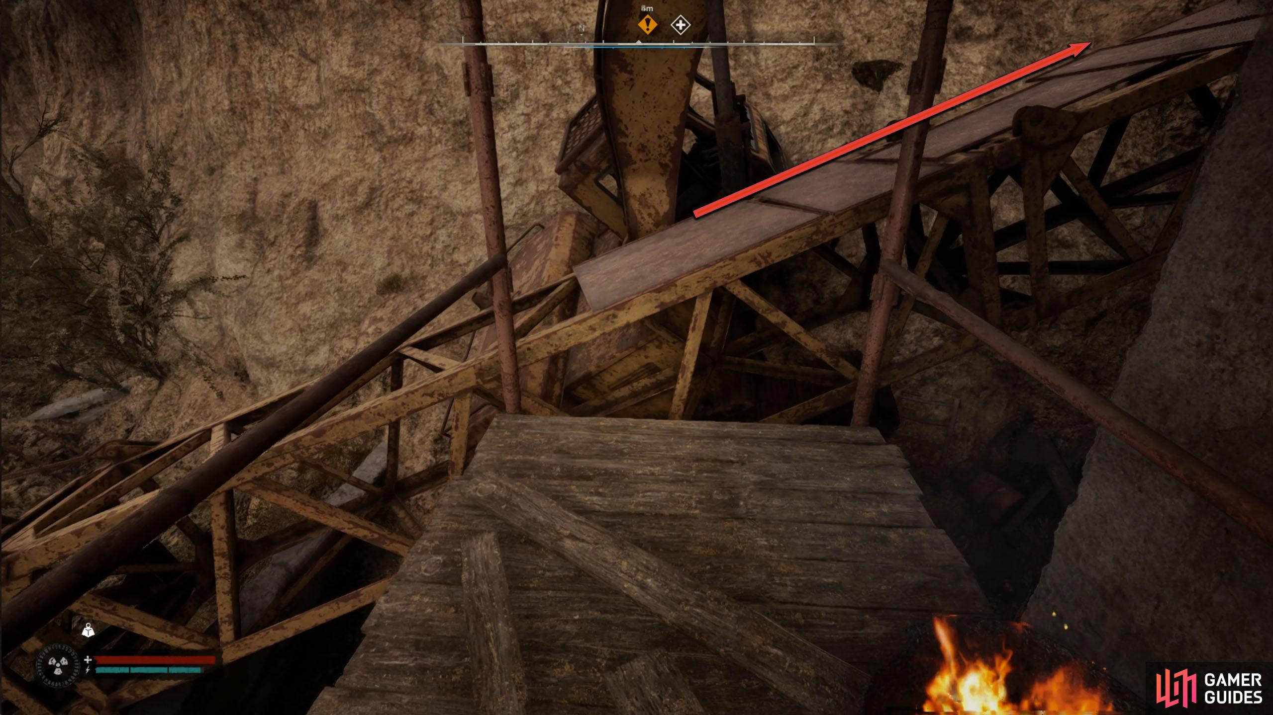 Jump across to the crane and follow it up.