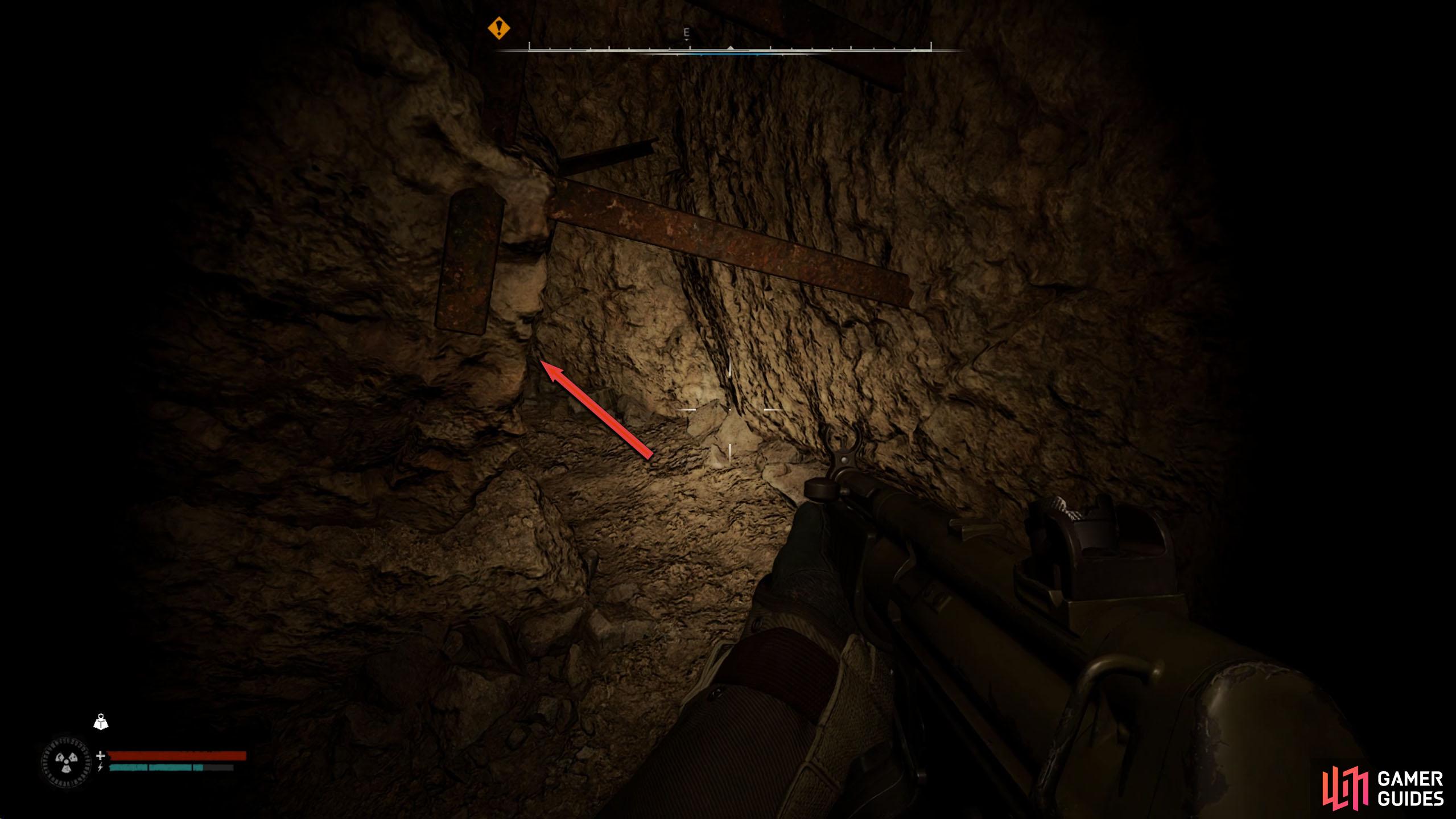 At the end, climb the concrete post, and crouch under the metal to the left.