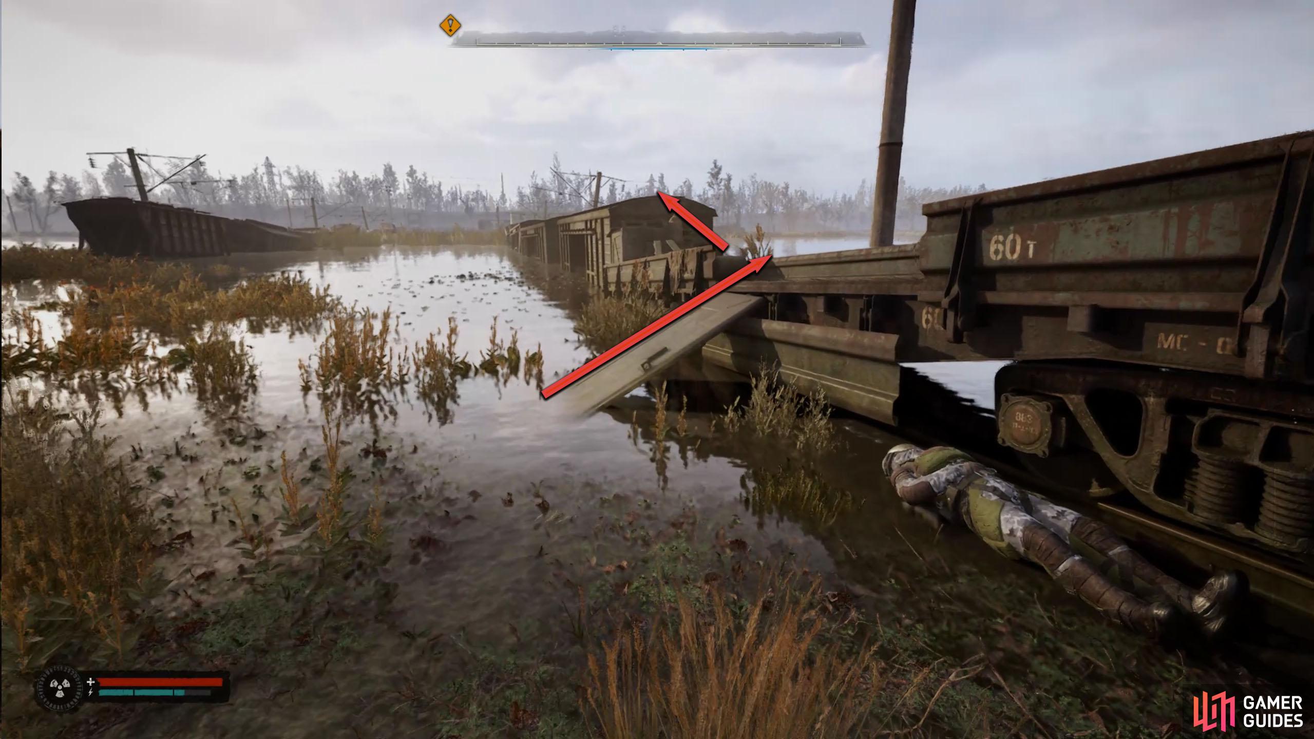 Climb up to the carriages, and follow them south across the river.