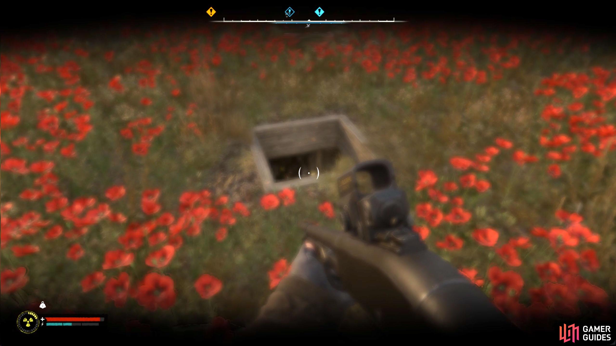 You’ll find it to the right of the wrecked house.