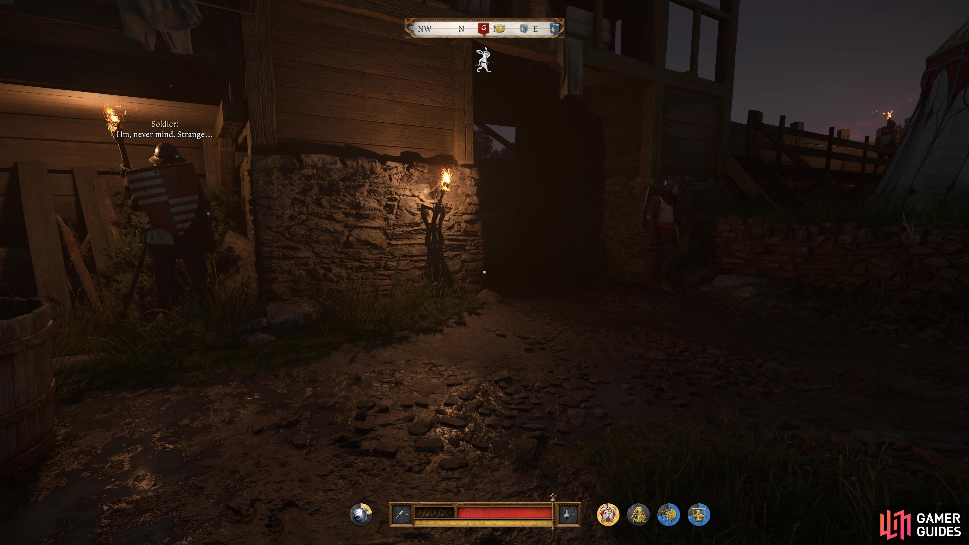 Then after tossing a rock to the right to lure the other guard, creep between them to reach the gate and open it.