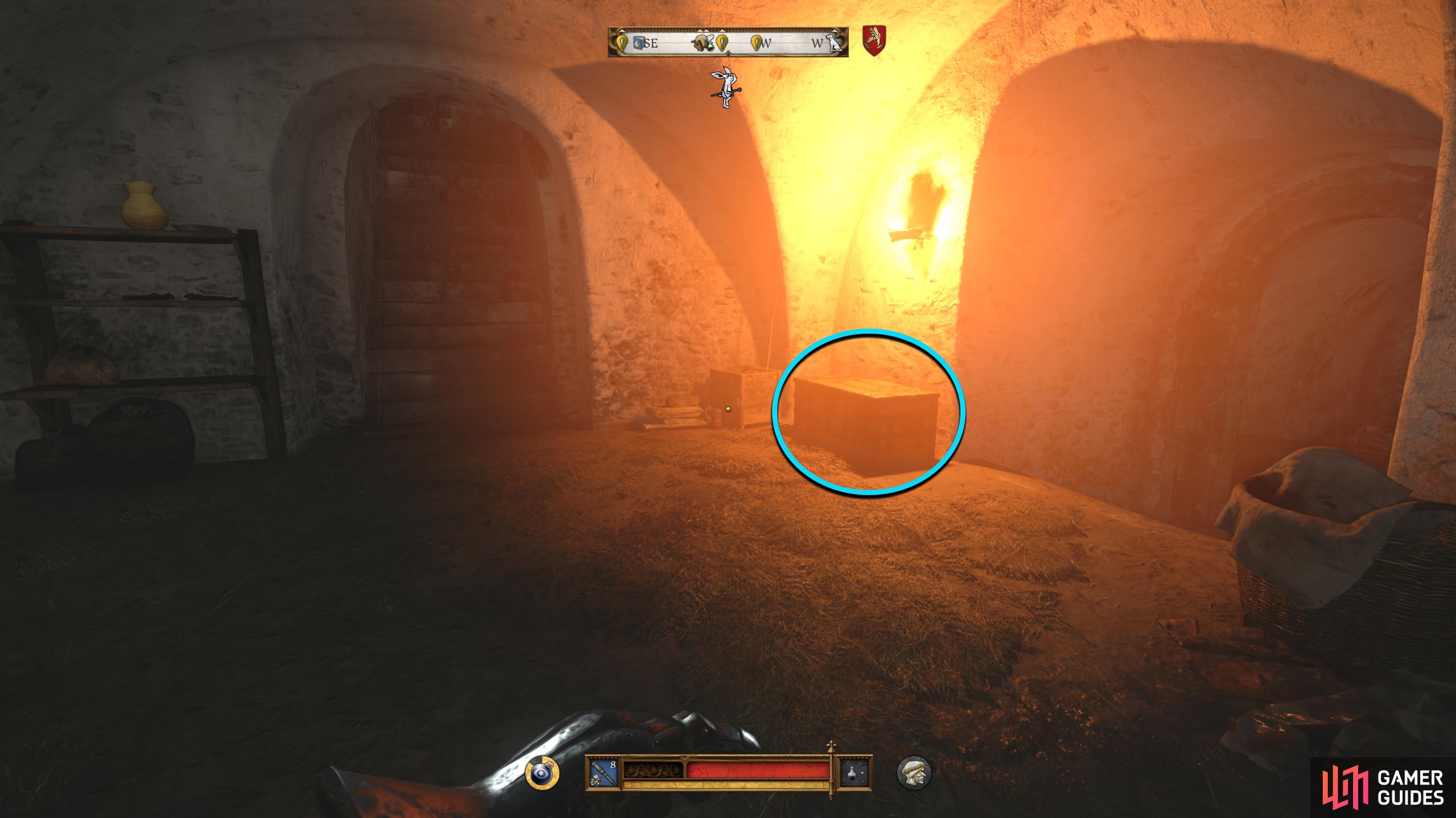 The chest containing the document will be under the torch to your right.
