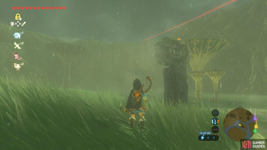 The orange orb is on a taller statue