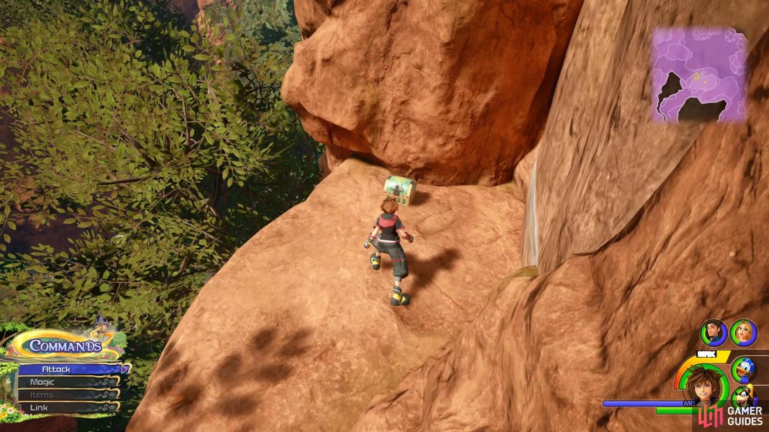 Jump over the wall to the right after the second branch.