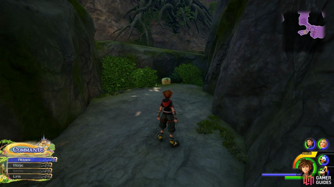 Search to the left of the archway.