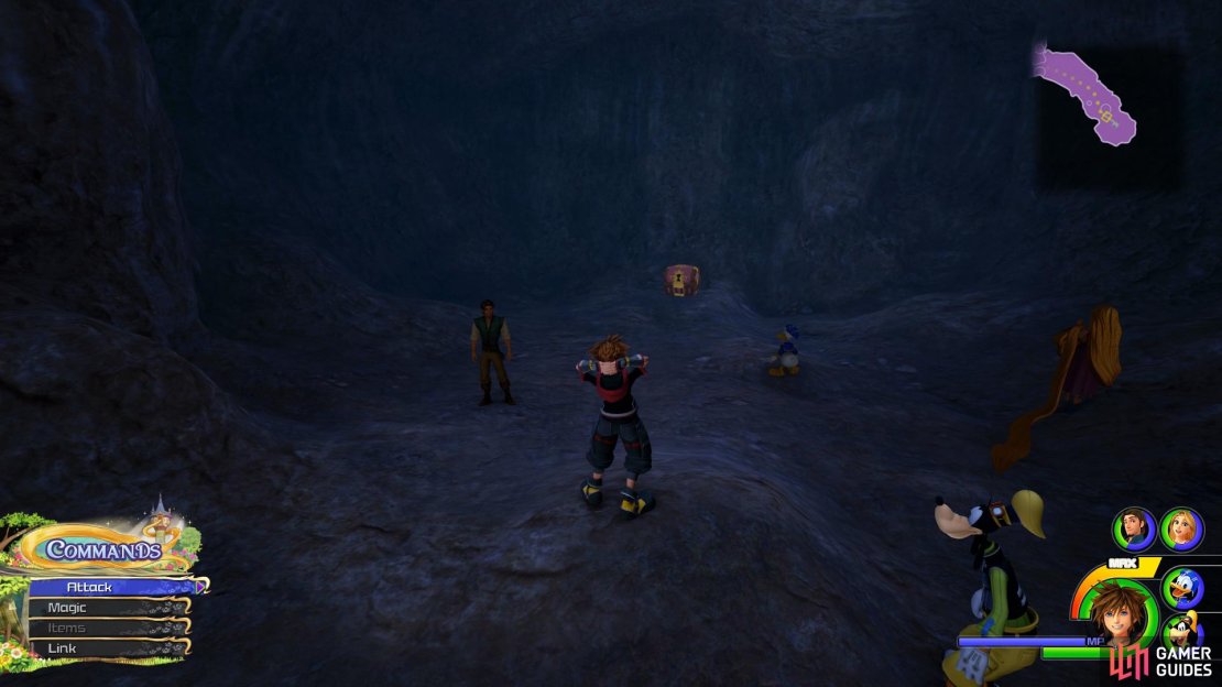 The chest sits at the back of the cave.