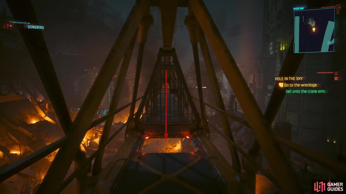 Climb up the ladder to your right, follow the crane, and drop into the hole.
