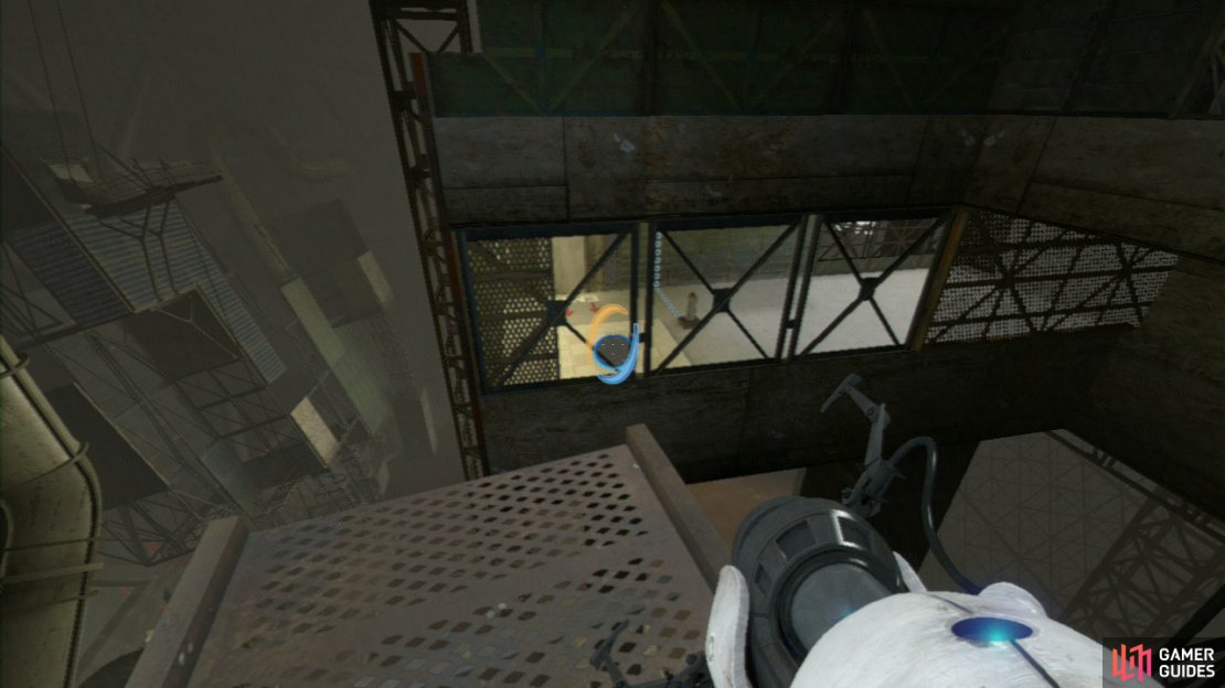 At the end of the walkway you’ll be overlooking the actual test chamber itself, so get a portal onto the floor in here and step back through the portal you just came through and you’ll reappear in the third chamber.