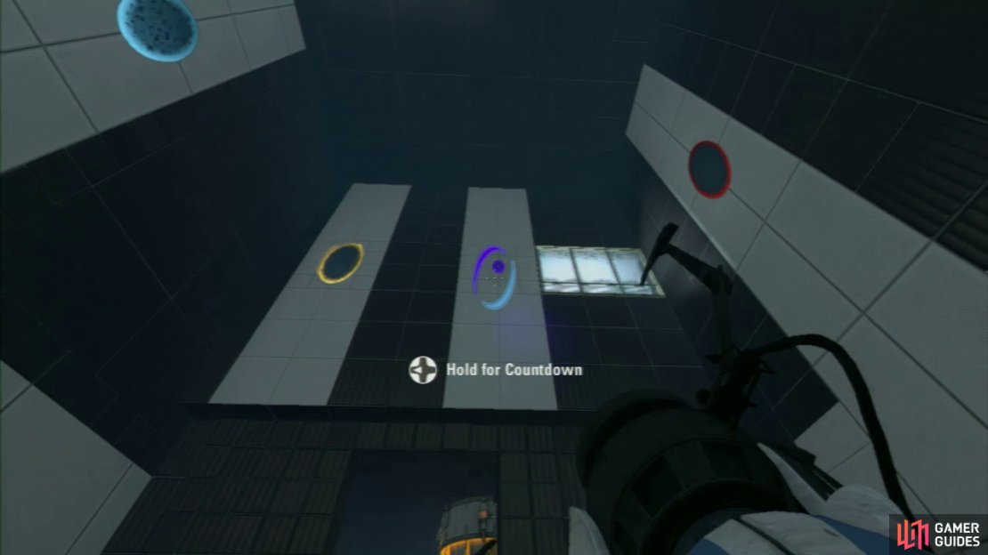 Player 1: Once you enter the room, you should notice the two red buttons up on the wall straight ahead of you. There are also two Arial Faith Plates located on the ground on both the left and right-hand side of the room. Your first task is to plant a portal on the blue ‘target’ on one of the walls, and then place an exit portal (at the same height) on the wall above the entrance to the room.