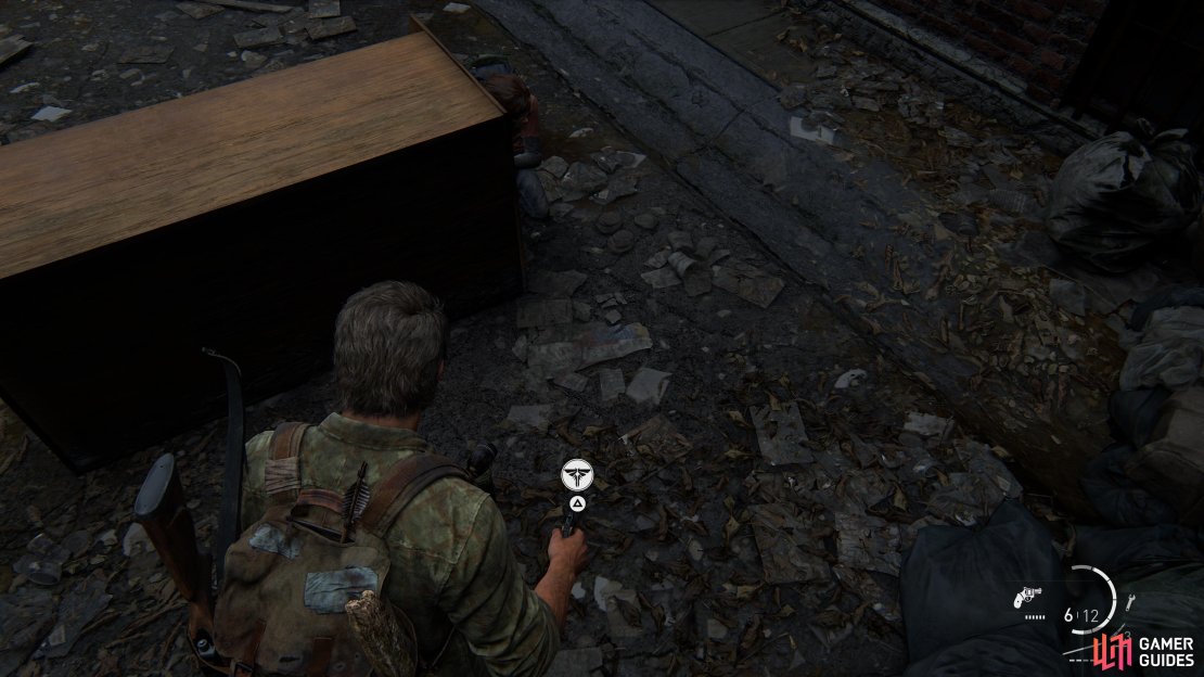Collect the Firefly Pendant - Mazden Risk from the floor behind a cabinet.