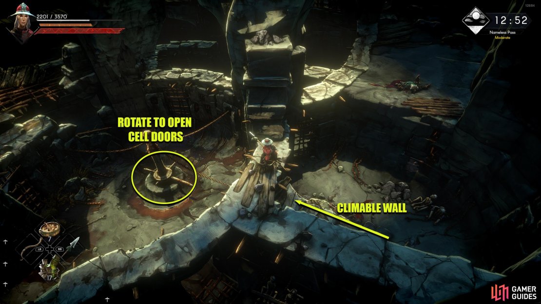 Rotate the wheel to open up one cell door at a time. Open the second cell door from your right.