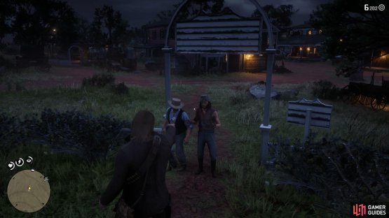 aim your weapon to scare away the two men visiting the Church.