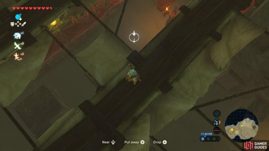 Drop the bananas far out from the guard so you have room to slip behind him
