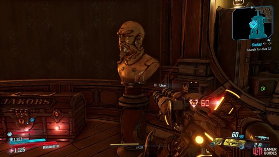 Interact with the statue that’s next to the chest,
