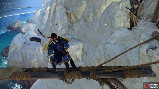 Head out to the log and look to the cliff to find a path across