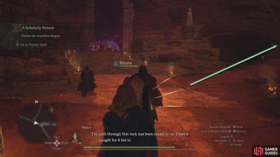 Follow the path right of the dragon, and continue following it until you get behind it.