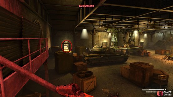 At the bottom of the main stairs, look north to find a doorway behind the tank.