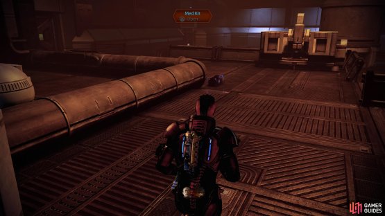 After the battle is finished, pick up the Med-Kit in the center of the room