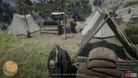 Enter the camp from here and head past the right side of the crate in front