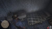 It’s on the shelf below the top on the table next to the bed