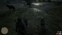 you’ll find two graves to examine to the west of the main path.