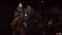 Go through the crack to reach Brok’s shop.
