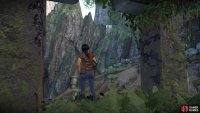 Climb the ruin to find the grapple hook point and swing across to the cave