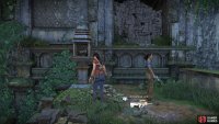 Find the animal statue marker next to the breakable wall