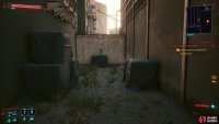 Head into the auto shop via the alley which is located behind the building. 