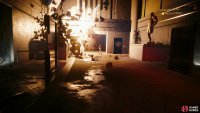 Follow Myers through the first room, crouching under a shutter knocked loose by the Chimera’s attacks,