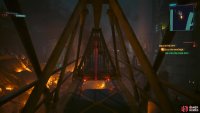 Climb up the ladder to your right, follow the crane, and drop into the hole.
