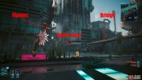 There are stairs at the end of the bridge underneath the building.