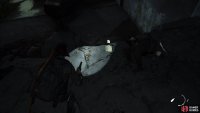 Head into the garage to the left of the water and you’ll find an Artefact inside