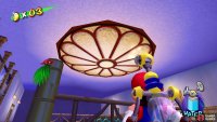 Spray the middle of the large light on the third floor to get Blue Coin #21