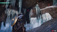 You’ll need to use the edge of the wall surface to enter the cave through the ice.