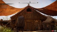 You can climb into the big house near the Great Hall from the northern side.