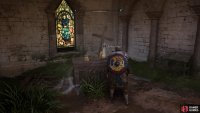 You’ll find the key to the chest on the altar within the church.
